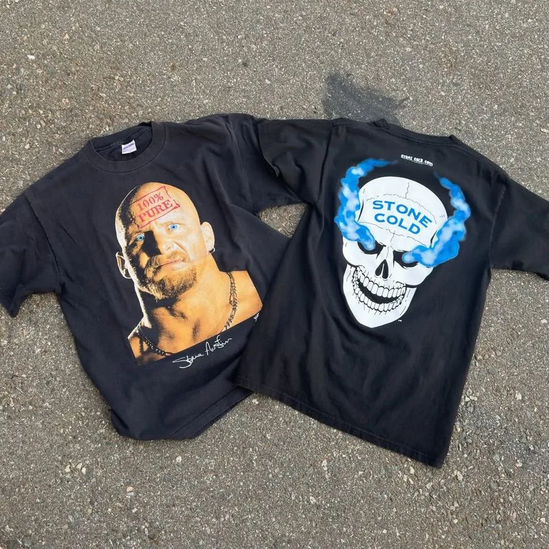 Two Stone Cold Steve Austin wrestling tees laid flat